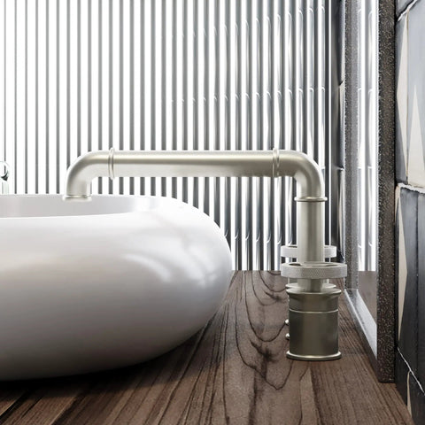 Side view of Avallon 8-Inch Widespread Bathroom Faucet With Two Handles, Brushed Nickel Finish, near a modern sink