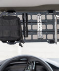 Rigid MOLLE Panel For Car Visor Organizer And EDC Pouch Holster with webbing slots mounted on sun visor, ABS matte panel visible.