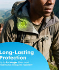 Man wearing Squito Stickers Mosquito Repellent Patches 78 Patch Pack outdoors, hiking with illuminated patch on jacket.