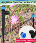 30 Pack Adjustable Drip Irrigation Emitters With Push To Quick Connect No Tools Needed To One Quarter Inch Tubing 360 Degree Rotating Water Spray Blue Vortex Emitters On Five And A Half Inch Stakes For Garden Watering System shown in garden setting with detachable cap cleaning detail