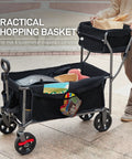 Person using Push And Pull Collapsible Shopping Cart With Wheels And Brakes Foldable Grocery Wagon With Built In Basket Side Pockets And Cup Holders Beach And Camping Utility Rolling Cart Black filled with items.