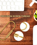 Heavy-Duty Brass Key Ring Clip Set 4 Pcs 3.35in Screw Lock Keychain with precision screw thread on wooden surface.