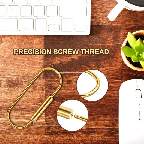 Heavy-Duty Brass Key Ring Clip Set 4 Pcs 3.35in Screw Lock Keychain with precision screw thread on wooden surface.