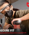 Person wearing Anti Fog Safety Goggles With Premium Anti Scratch Coating And Lenses UV Shield Vented Panoramic Eye Protection ANSI Z87 Lab Goggles