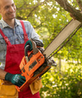 Man using chainsaw wearing ANSI A4 Cut Resistant Work Gloves For Men With Micro Nitrile Coated Palms Touchscreen Ready Anti Slip Grip Durable Safety Gear For Construction Woodworking Glass Handling 6 Pairs Pack Size Large