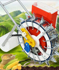 Manual Seed Planter Tool For Garden And Farm Portable Push Seeder With Seed Wheel And Spare Spring on cultivated field