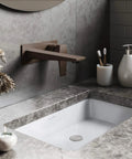Single-Handle Wall-Mount Bathroom Faucet In Oil Rubbed Bronze, Solid Brass Construction, 1.2 GPM Flow over marble sink