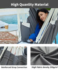 Woman relaxing in Heavy Duty Hanging Hammock Chair Swing With Footrest For Outdoor Patio Porch Lounge Up To 500 Lbs, Dark Grey
