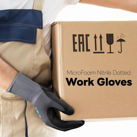 Person wearing Durable Work Gloves For Men And Women Gray Nylon With MicroFoam Nitrile Coating 6 Pairs Pack holding cardboard box