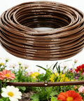 One Quarter Inch Drip Irrigation Tubing With Six Inch Emitter Spacing, 100 Foot Roll, Built In 0.5 GPH Dripper in garden setup