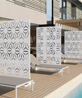 72 Inch Tall Metal Privacy Screen Three Panel Outdoor Freestanding Privacy Panel For Patio Backyard Deck With Anti Tipping Kit Weather Resistant Steel And Easy DIY Assembly Modern Geometric Design In White by the pool.