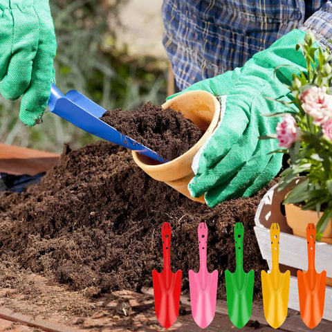 18 Piece Colorful Garden Shovel Set For Teens And Adults Mini Metal Hand Trowels being used for planting in soil, view of blue trowel