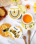 Bee Themed Diamond Painting Coasters Kit With Holder Eight Pattern Coasters Featuring Bee Gnome And Sunflower Designs For Adults DIY Craft Gift Supplies Drill Pen Diamond Tray And Glue Included with bee and sunflower design coasters, cup, and honey dipper on table.