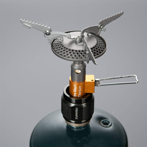 Z1 LPG Propane Snug Fitting No Leak Canister Adapter installed on a camping stove, premium aluminum, safe leak-free connection.