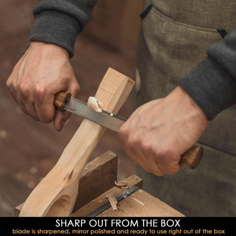 Hands using a Straight Draw Knife For Wood Carving Featuring Hella Comfy Solid Oak Handles Coated In Natural Linseed Oil on wood.