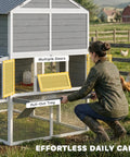 Person cleaning a huge 77 inch outdoor chicken coop for 6 to 8 chickens with run, wooden hen house with pull-out tray in gray.