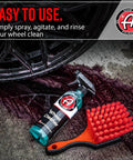 Wheel Cleaner 16oz Tough Spray For Car Wash Detailing That Destroys Brake Dust And Grime bottle next to wheel brush and clean rim