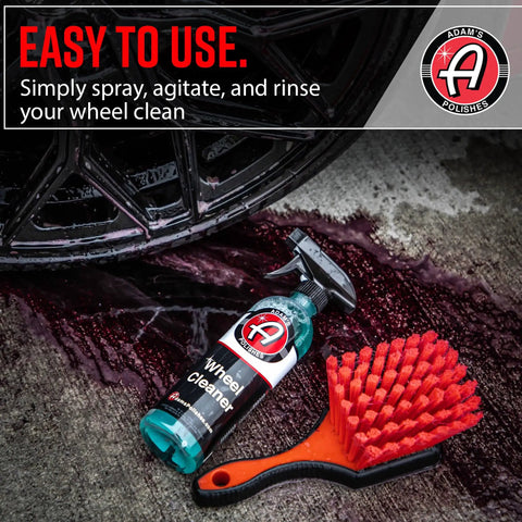 Wheel Cleaner 16oz Tough Spray For Car Wash Detailing That Destroys Brake Dust And Grime bottle next to wheel brush and clean rim