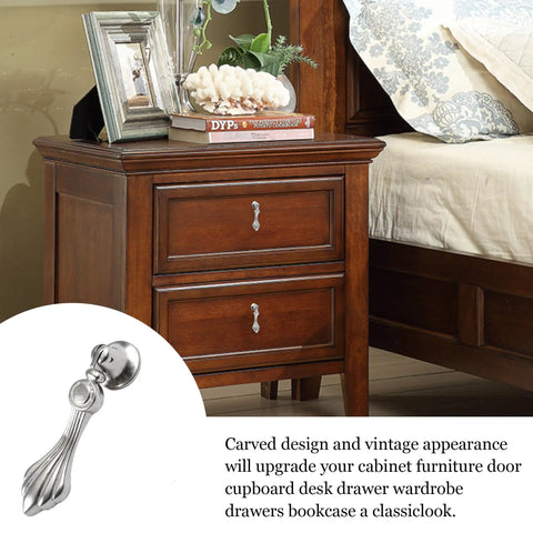Six Pack Vintage Zinc Alloy Pendant Pulls Featuring Knockout Fluted Tear Drop Shape And Slick Silver Plate Finish For Straight Up Home Refresh Cabinet Wardrobe Door Hardware Upgrade displayed on wooden nightstand.