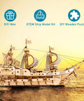 3D Wooden Sailboat Puzzle Kit For Adults, Vintage Watercraft Model To Build displayed against sunset background