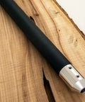 Heavy Duty Aluminum Woodturning Handle With Badass Foam Grip Fits Full Size Half Inch Tang Carbide Turning Tools on natural wood surface.
