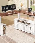 L Shaped Electric Standing Desk With Four Wood Drawers Farmhouse Executive Workstation Height Adjustable Sit Stand Table Home Office Gaming Setup Big Boy Workspace Smooth Motor Rock Solid Build featuring dual monitors and storage.