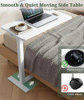 Portable Sit Stand Desk With One Press Pneumatic Lift Hidden Casters Rolling Laptop Table On Wheels beside bed with laptop