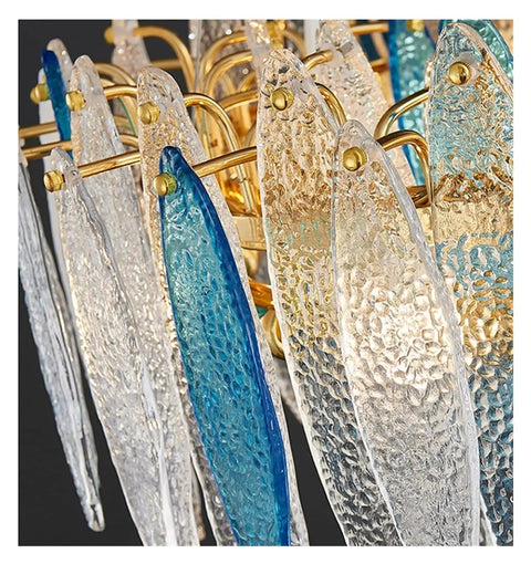 Modern Luxury Round Metal Plate Glass Pendant Light With E14 Base For Foyer And Dining Room Offers Chill Non Glare Ambient Glow To Totally Slay Your Home Decor Setup As Quality Hanging Lamp close-up showing textured glass shades and gold accents.