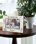 Hot Air Balloon Baby Boy Picture Frame 4x6 Inches, Solid Wood Nursery Decor Gift From Mom, The Adventure Begins Photo Frame on table