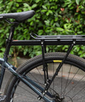 Rear Bike Rack For Touring And Everyday Rides Universal Seat Post Mount Cargo Carrier Pannier Ready Bicycle Luggage Rack Holds Up To 66 Pounds Durable Steel Hauls More Gear On Long Rides mounted on bike