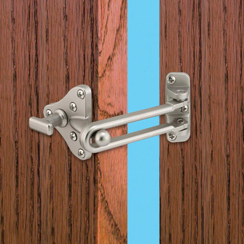 Swing Bar Door Guard With High Security Auxiliary Lock Satin Nickel Finish installed on wooden door