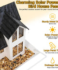 Heavy Duty Metal Outdoor Bird Feeder With Solar Lights shaped like a house, black roof, seed tray, and solar panel.