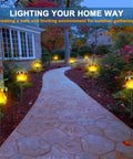 Solar Tiki Torches With Flickering Flame Outdoor Solar Lights Waterproof Auto On Off Solar Powered Decorative Lighting For Garden Yard Landscape Patio Driveway Walkway Pathway lighting a stone pathway in a garden.