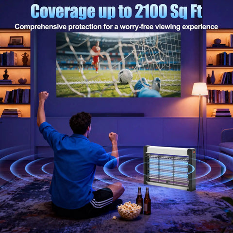 Man watching a soccer game on TV with Indoor Bug Zapper 20W With 3 Lamps Quiet UV Light Mosquito Trap And Insect Killer nearby in living room