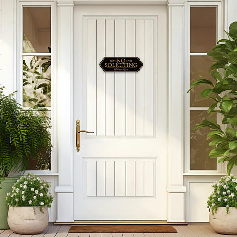 No Soliciting Sign For Front Door Self Adhesive Vinyl Modern Sign For Home in black and gold on white door.