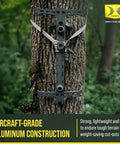4 Pack Lightweight Non Slip Aluminum Climbing Sticks For Tree Stand Hunting Gear And Platform Helium 20 Inch Portable Safety Accessories For Deer Hunters Climbers And Shooters attached to tree.