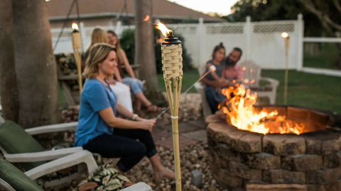 Easy Pour 12 Pack Bamboo Torch Set With Classic Weave Brown Finish Outdoor Lawn Patio Garden Lighting by a fire pit