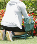 Gardener using Heavy Duty Folding Garden Kneeler Seat Bench With Thick And Wide Soft Kneeling Pad And Large Tool Pouch in garden