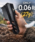 Hand holding Ultralight Backpacking Trowel Shovel for Camping and Hiking, 27g Anodized Aluminum Digging Tool against mountain backdrop
