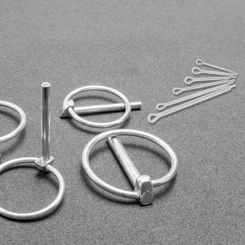 Stainless Steel Cotter Pin Assortment Kit for Automotive Gearheads and Trailer Hitch Projects with locking pins on gray surface