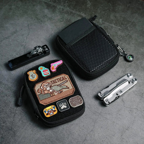 EDC Pocket Organizer Pouch With DIY Patches Area Nylon Utility Pocket For Everyday Carry next to multi-tool and flashlight