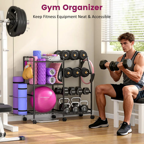 All In One Home Gym Organizer Rack With Wheels And Hooks For Dumbbells, Kettlebells, Yoga Mats, and Foam Rollers in use