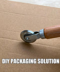 Top Tier 5 Piece Box Resizer Kit Featuring Scoring Wheel Perforator on cardboard, ideal for DIY custom shipping cartons.