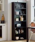 Sturdy Six Tier Floor Bookcase standing about 70 inches tall with solid build and tipover resistant design in kitchen setting.