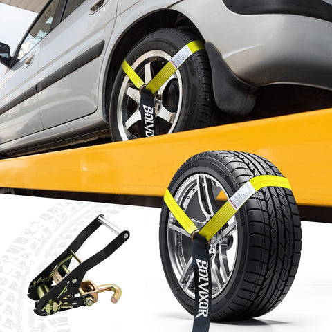 Four Pack Beefy Car Tie Down Straps For Trailers Two Inch By Ninety Six Inch With 9900 Lbs Break Strength Tire Ratchet Straps with J Finger Hooks securing car and tire.