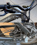 Beefy 4-Piston Hydraulic Disc Brake Kit For E-Bikes And Mountain Bikes with aluminum lever and caliper installed on a bike
