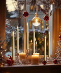 12 Pack Ivory Flameless LED Taper Candles, 11 Inch Tall, Battery Operated With Bottom On Off Button in holiday window display