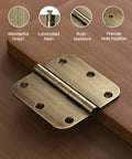 Antique Brass Interior Door Hinges 3 1/2 Inch With 5/8 Inch Radius, 18 Pack Built To Last Heavy Duty Residential Door Hardware, 6 Holes Each, Rounded Corners, Fits Most Interior Doors, shown uninstalled on a wooden surface highlighting hinge details.