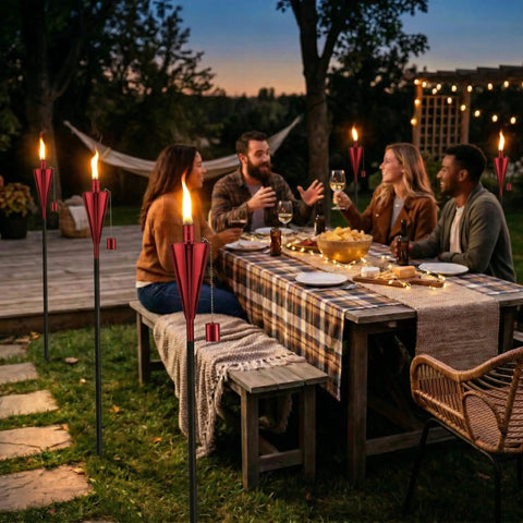 Group enjoying garden with 55 Inch Outdoor Oil Torch Lamps 2 Pack In Rose Gold, Rustproof Stainless Steel Citronella Torches