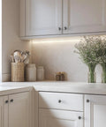 White kitchen cabinets with Vintage Pewter Kitchen Cabinet Knobs Set 25 Pack One And A Quarter Inch Ring Style Drawer Knobs For Dresser Cabinets Antique Pulls To Upgrade Your Home Decor Dope Hardware installed, featuring a modern countertop and decorative jars.